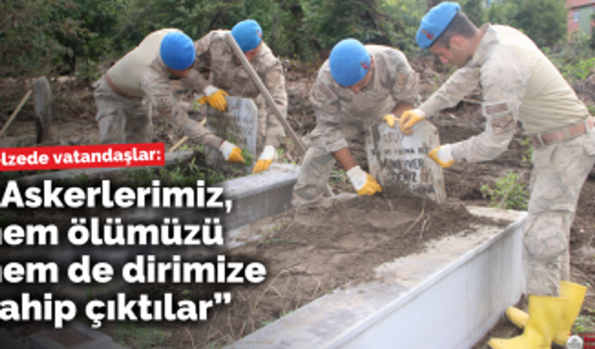 ASKERLER, SELDE ZARAR GÖREN MEZARLIKLARI TEMİZLEDİ